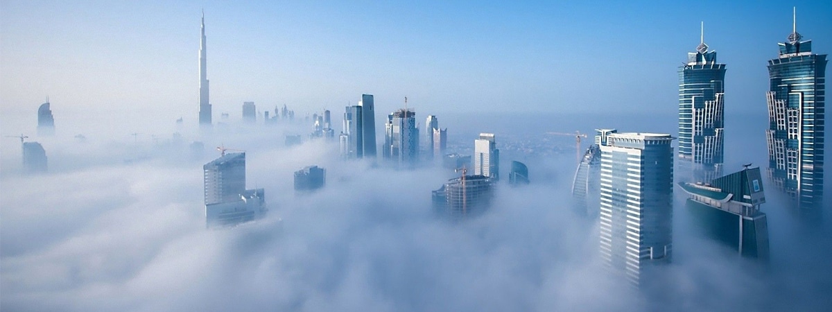 Skyscraper buildings in the fog
