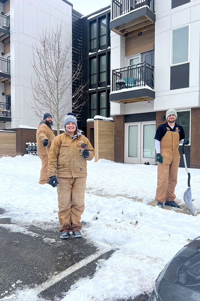 Bradley Company property management staff work on snow removal at GrandView Flats & Townhomes in Granger Indiana