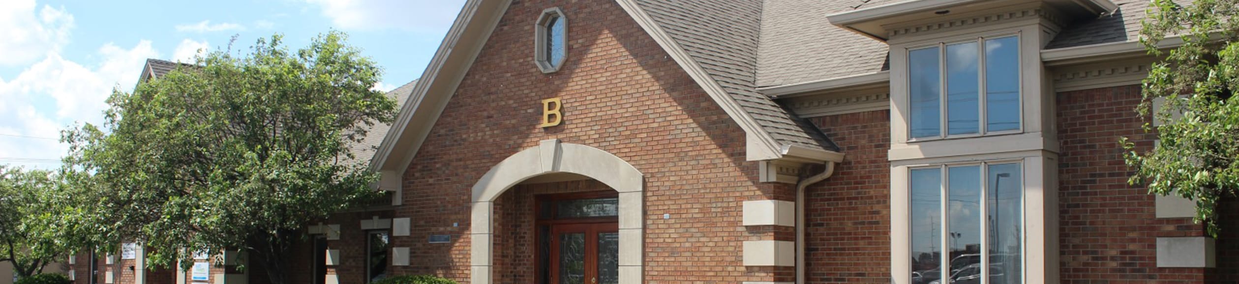 Multi-tenant office condominium property auction and seller representation; commercial real estate services provided by Bradley Company