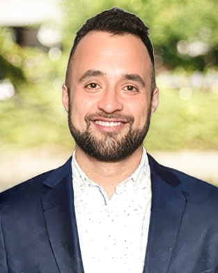 Andrew Storey, Assistant Property Manager at Bradley Company in Indianapolis, posing outdoors for a professional headshot
